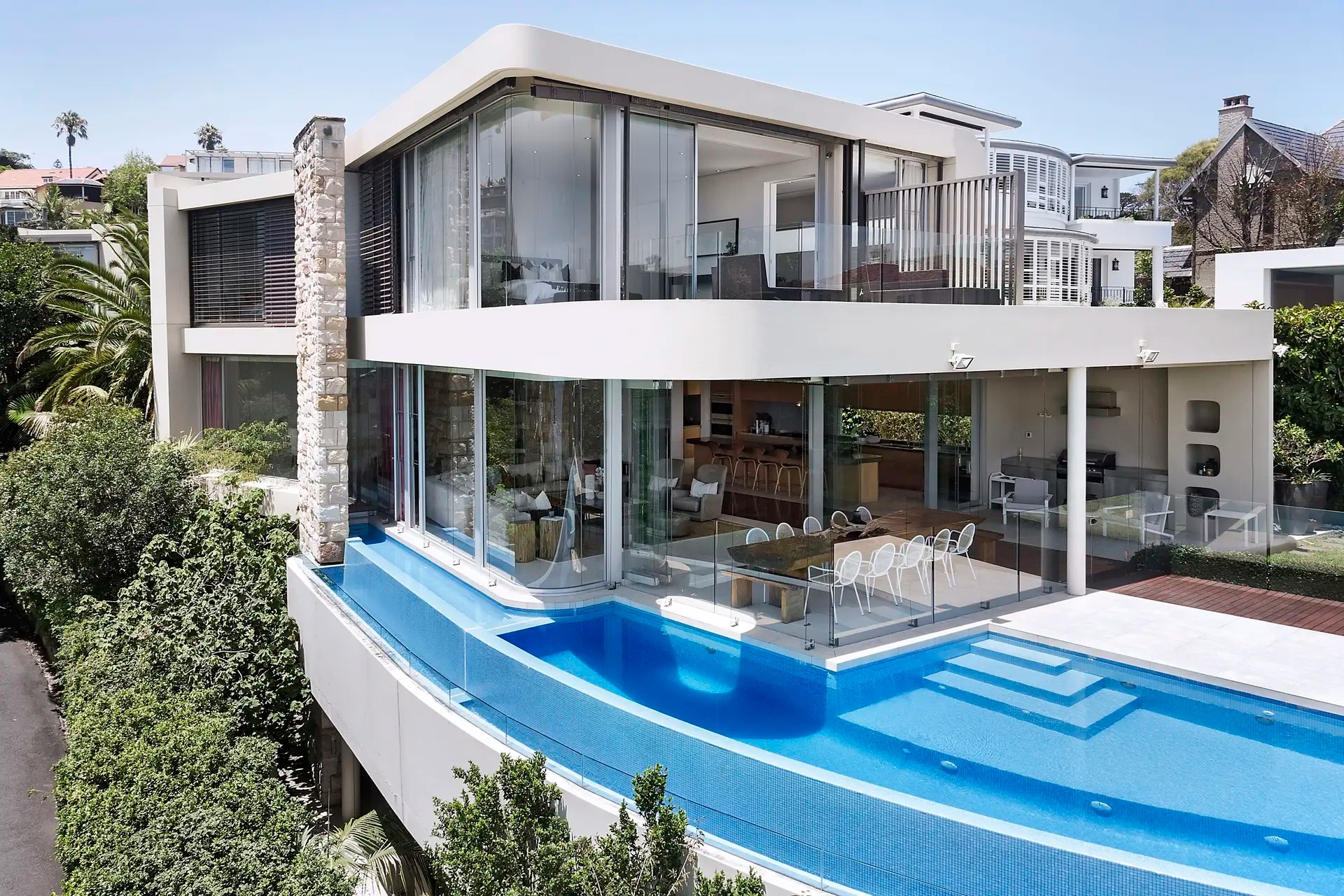Luxury exterior repaint of a high-end Vaucluse home with infinity pool by Brushworks